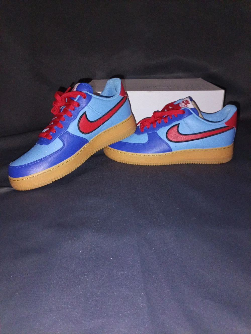 Nike Low-Top Sneakers in Light Blue, Royal Blue & Red with Gum Sole
